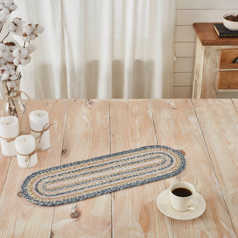 Kaila Jute TAble,  rich texture of braided jute is given a modern twist with soft blue, golden tan and misty rose tones for a casual country boho style.