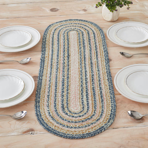 Kaila Jute Table,  rich texture of braided jute is given a modern twist with soft blue, golden tan and misty rose tones for a casual country boho style. 
