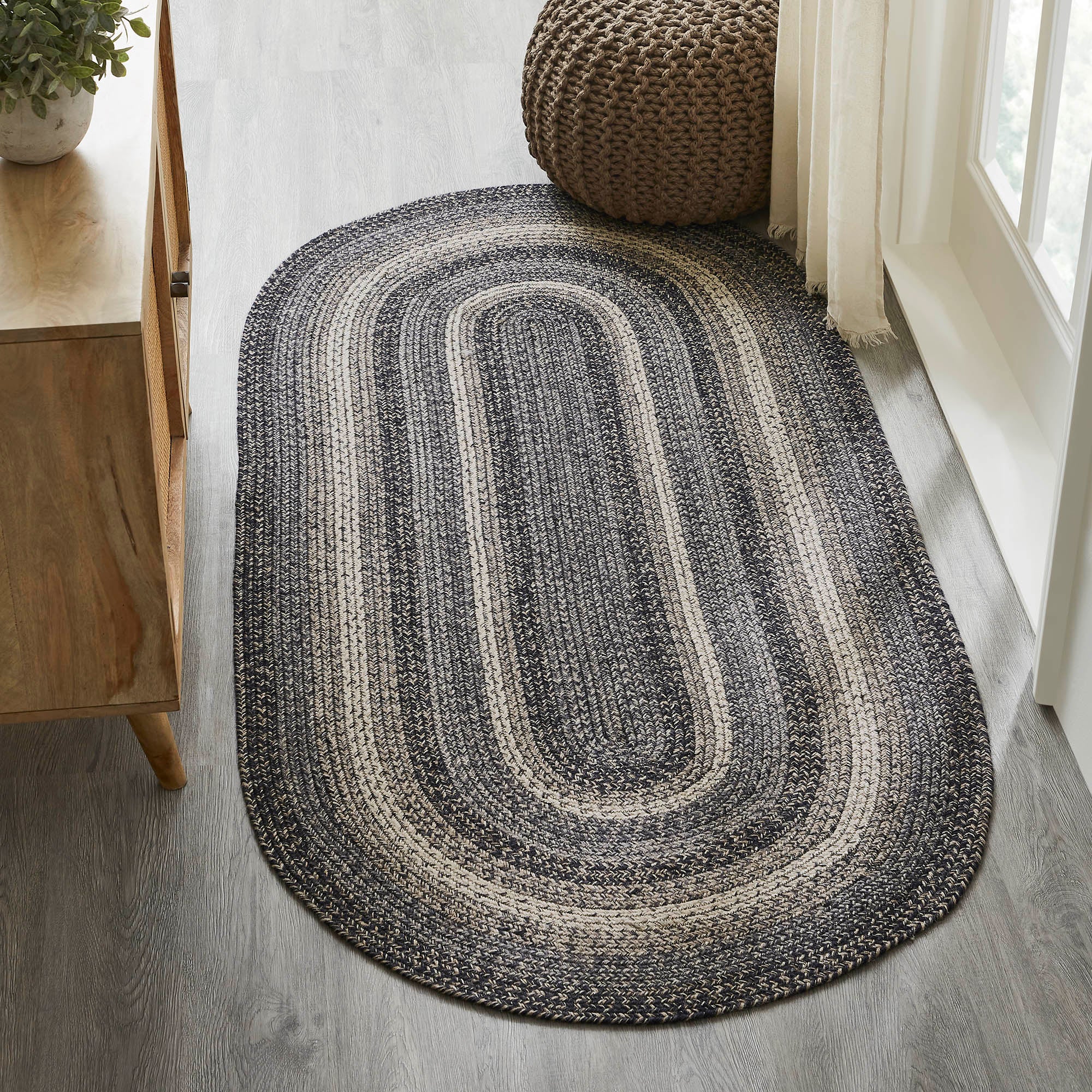 https://allysonsplace.com/cdn/shop/products/83539-Sawyer-Mill-Black-White-Jute-Rug-Oval-w-Pad-36x72-detailed-image-1_83462176-874d-428a-a58e-9d5195a3ce21.jpg?v=1676661109