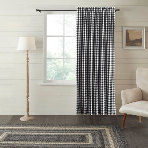Black and white checks create the perfect accent to your modern farmhouse window decor. The Annie Buffalo Black Check Blackout Panel includes a single 84x50 inch cotton window panel with a matching tie back. The room darkening panel includes a blackout lining crafted from 100 percent polyester to add practical benefits without sacrificing style. The panel is easy to hang with a generous 3.25 inch rod pocket with a 2 inch header. Machine washable and iron safe.