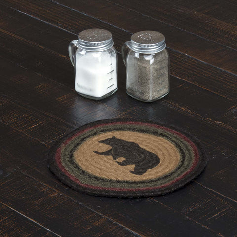 Wyatt Stenciled Bear Jute Trivet 8, A black bear is stenciled the center over solid dark tan surrounded by concentric braids of black, crimson, and army green.  Primitive Country Farmhouse Kitchen Table Dining Home Decor.
