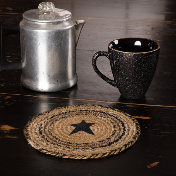 Kettle Grove Jute Trivet Stencil Star 8, Featuring beautiful concentric circles of braided jute in tan, black, and brown with a country black primitive star in the center. Primitive Country Farmhouse Kitchen Table Dining Home Decor.