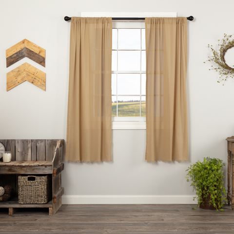 Add rustic charm with the Tobacco Cloth Khaki Short Panel Fringed Set of 2 (63x36). Lightweight cotton panels with fringe bring farmhouse elegance to your windows.