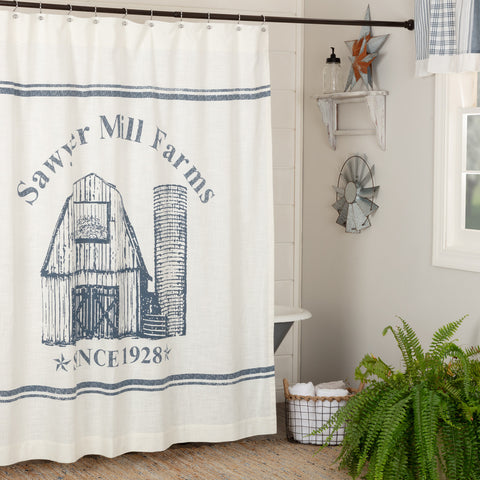 Sawyer Mill Blue Barn Shower Curtain 72x72 depicts a vintage-inspired barn in blue and white with the words "Sawyer Mill Farms" above it. Primitive Country Farmhouse Bath Bathroom Home Decor.