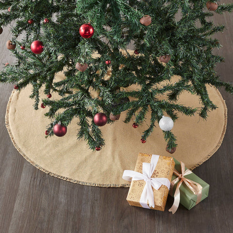 Yuletide Burlap Tan Tree Skirt 36 Add rustic style to your Christmas traditions with the Yuletide Burlap Tan Tree Skirt. The round tree skirt features a 36 inch diameter. A warm tan base constructed with a soft cotton burlap will add simple, sophisticated style for a perfect farmhouse Christmas look.