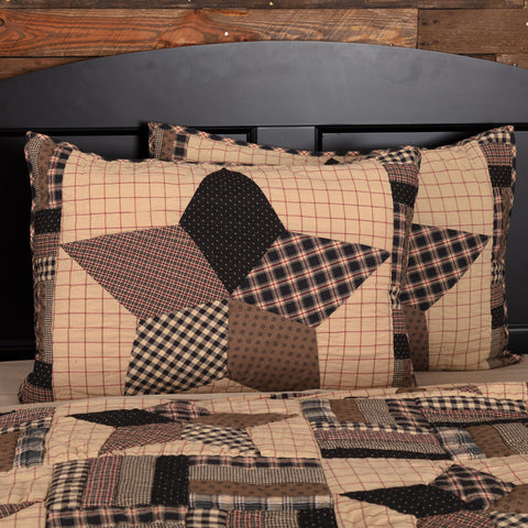 Bingham Star Standard Sham 21x27, Large 5-point patchwork star block flanked with rotating strip blocks black and tan fabrics with red accents. Primitive Country Farmhouse Quilted Bedding Home Decor.