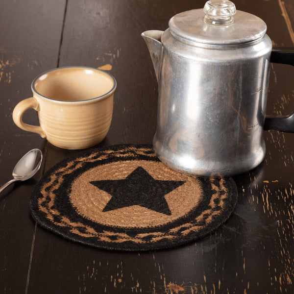 The Farmhouse Jute Trivet Stencil Star sets the primitive table beautifully with alternating black and tan braids. A stenciled black 5 point star in the center. Primitive country Farmhouse Kitchen Home Decor.