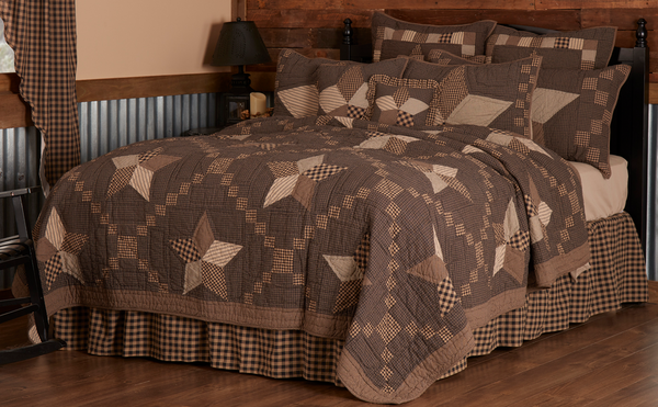 The Farmhouse Star Queen Quilt features large 5 point stars set on a black micro plaid, crisscrossed with a traditional Irish chain in black/khaki check patches. Primitive Country Farmhouse Quilted Bedding Home Decor.