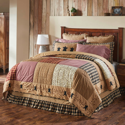 The Pip Vinestar Queen Quilt  features stars, vine borders, and block patchwork in black, burgundy, and natural tones. A timeless primitive country quilt.