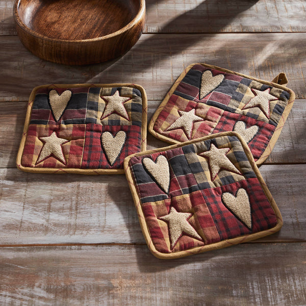 Set of 3 quilted 8x8 Connell Patchwork Pot Holders. Heat-resistant cotton with rustic burgundy tones adds primitive country charm to your kitchen.