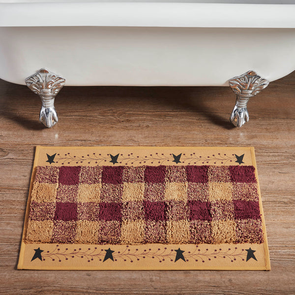 Add rustic country charm to your bathroom with the Pip Vinestar Bath Mat. This 20x30 cotton bath mat features a primitive stars print, absorbent cotton, quick-dry comfort, and machine-washable durability.