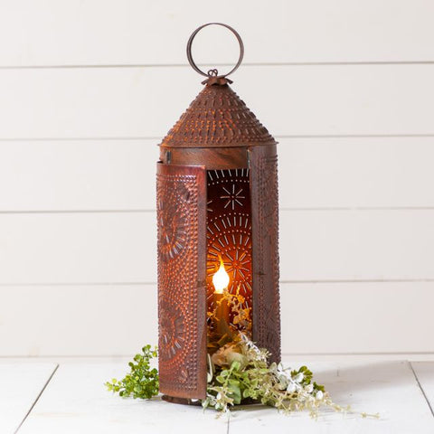 Our original Revere Lantern has been updated with our most popular punch pattern. The punching casts a warm cozy glow on your wall. A terrific accent piece for your living area. Rustic Tin finish. Visit website for FREE s/h & discount offers.