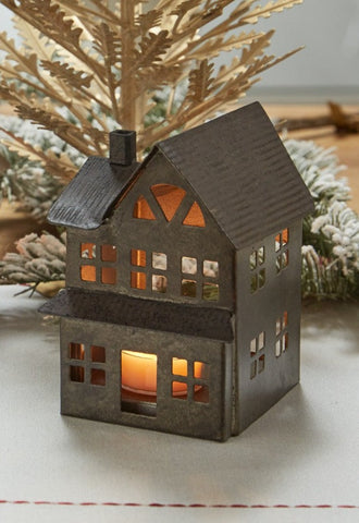 Rustic galvanized Metal House Tea Light Holder with cut-out windows creates a cozy flickering glow. Perfect for shelves, mantels, or seasonal farmhouse décor.
