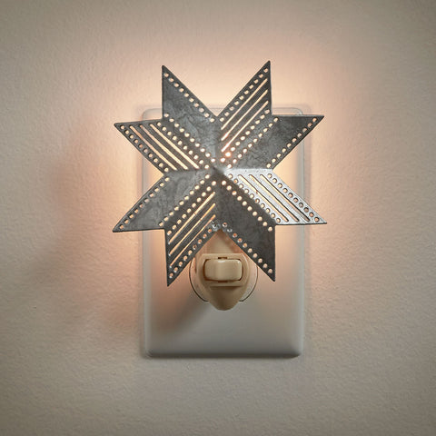 Light the way in those dark places in your home with this beautiful Folk Star Night Light ! Will complement any decor!  Dimensions: 4" H x 4" W x 1.5" D Bulb included