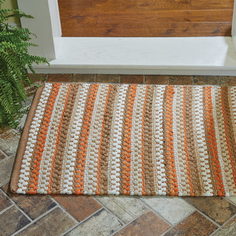 Beautiful fall tones of orange, brown, white, and tan combine with a chunky Chindi weave to create the stunning Pumpkin Seed Chindi Rug! Pair with the rest of the collection for a complete look!