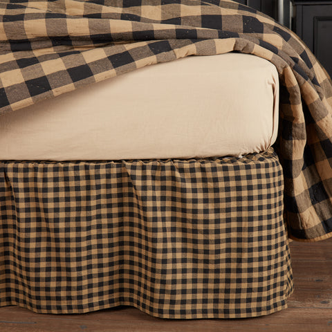 Add farmhouse charm with the Black Check King Bed Skirt. Primitive black & tan checks with 16" drop, ruffled corners, and durable cotton design.