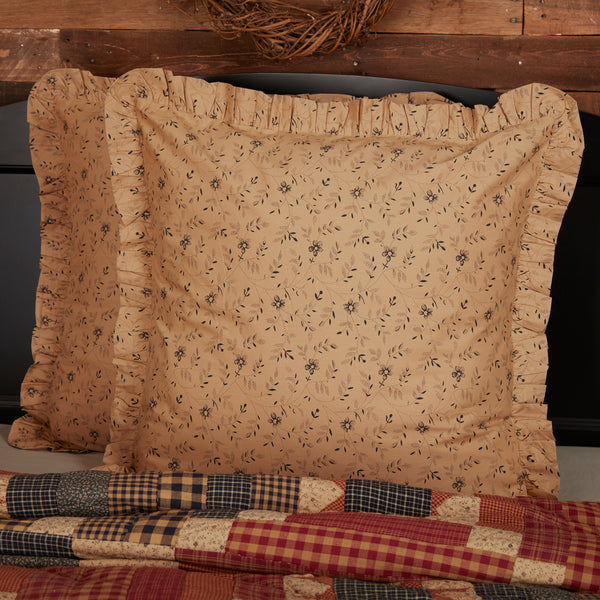 Maisie Fabric Euro Sham 26x26 in tan with black ditsy floral print and ruffle trim. Primitive country farmhouse bedding accent with button closure.