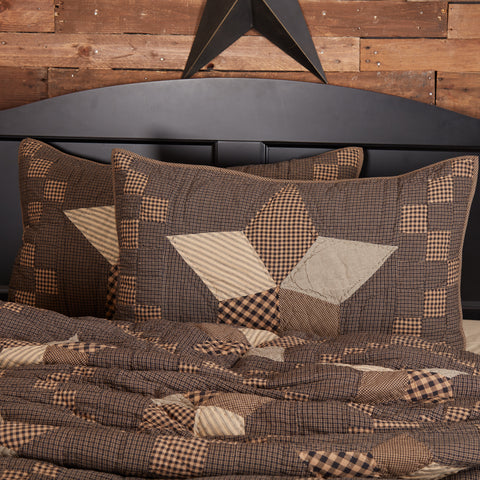 Farmhouse Star King Sham features a patchwork star in rustic tones. Hand-quilted cotton, reversible, machine washable, and perfect for primitive country style.