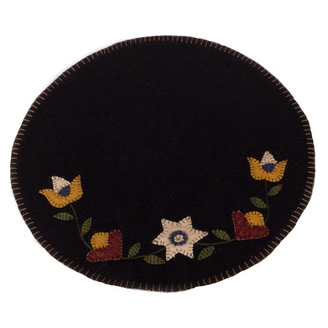 Our Black Flowering Vine Candle Mat is made of Wool-Felt. Size is 15 Inch diameter..