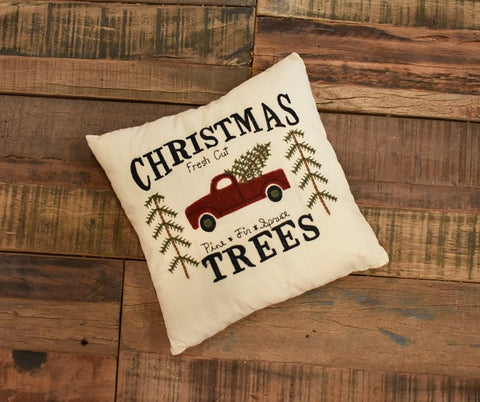 Christmas Tree Pillow 10x10 Features a classic red truck holding a Christmas Tree.