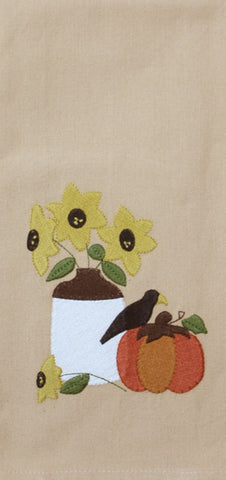 The Fall Sampler Towel features applique details of a pumpkin, crown and flower vase. Perfect for your Fall Decor.