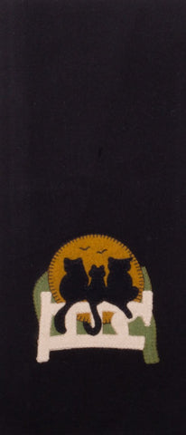 Our black Cats on a Fence Black Towel (set of 2) fetures a trio of black cats sitting on a fence in front a full moon.