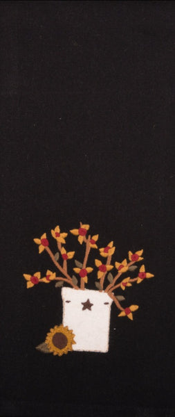 Our black BitterSweet Crock Black Towel (set of 2) features a star crock holding flower with sunflowe detail. 