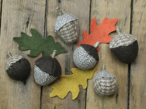 The Felt Acorns and Leaves Bowl Filler is perfect for adding charm to mantles, tier stands, centerpieces, side tables and more. The felt acorns and leaves fills are made of wool felt.
