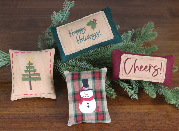Country Christmas Fill set of 4, perfect for adding charm to mantles, tier stands, centerpieces, side tables and more. Features quality embroidered and appliqued details on cotton fabric. Ships as a set.