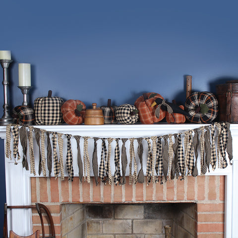 Our Black Check and Ticking Fabric Ties Black Garland is made of cotton. This garland is 4.5 feet long. The unique design lends a distinctive touch. 