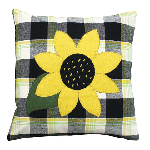 The Sunflower Buffalo Check Pillow features an applique sunflower in the middle of the pillow on top of buttermilk, black, yellow and green checks.