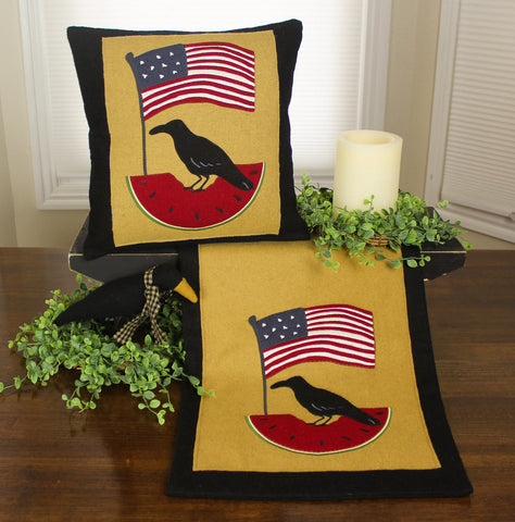 A beautiful accent to your living space, the Flag Crow Pillow features intricate felt applique and embroidered details. Pillow measures 14"x14". Made of Wool Felt and 100% Cotton. Spot Clean/Dry Clean.