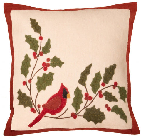 Cardinal Holly Pillow has a cream background with a cardinal sitting on a holly branch.