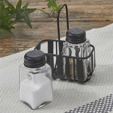Keep seasonings stylishly on hand with the Spencer Salt & Pepper Caddy Set. Sturdy black caddy with glass jars adds rustic farmhouse charm to your kitchen.