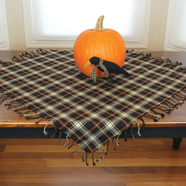 Primitive Fall Plaid Black Table Square 36" (set of 2) features a plaid design in colors of orange, black and cream finished with fringe edges.