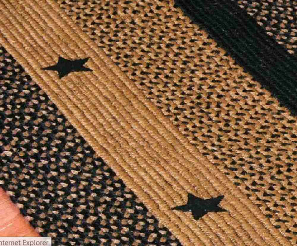 Star Black Braided Jute Rug Close-up