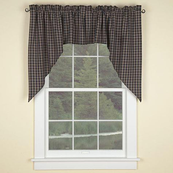 The Sturbridge Swags in a charming navy & tan plaid provide a delightful dressing for your windows! Simple, yet striking, they come unlined to allow soft filtered light to shine through! Pretty on their own, or pair with coordinating tiers for a more striking appeal! 