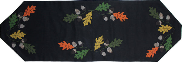 Fall Leaves & Acorns Table Runner 45"features beautiful appique detail of multi colored leaves and acorns on black a black background.