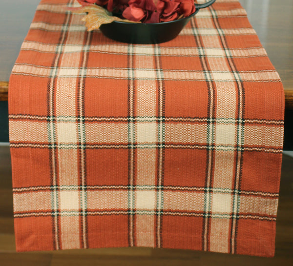 Harvest Moon Table Runner (set of 2) features a pumpkin spice, black, and cream plaid.  Finish the look with these coordinating items! Meaures 14" x 36"