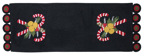 Candy Canes Black Table runner, background is made of black felt with two candy canes at either end, nestled with holly and jingle bells.