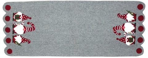 Holiday Gnomes Gray Table Runner features 3 Gnomes at either end holding a present, candy cane and a Christms Tree.