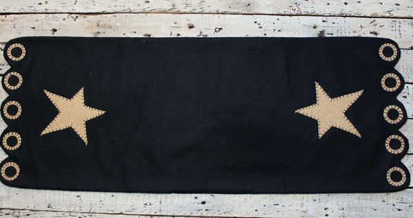Black & Tan Star Table Runner measures 14 in x 45 in and is made of wool felt.  Perfect for you Primitive Home.