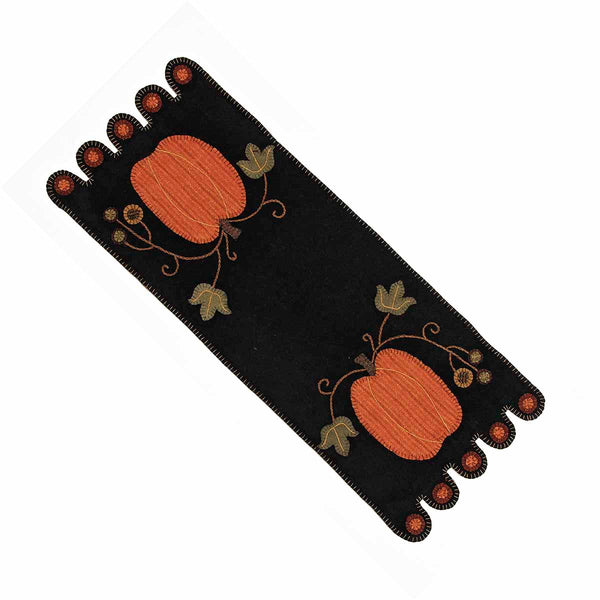 Our pumpkin table runner is made of wool felt. This is a 14" x 36" table runner that will give your style., home décor , fall  Made of wool felt Measures 14" x 36" Pair with matching pillow to complete the look!