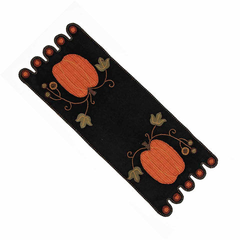 Our pumpkin table runner is made of wool felt. This is a 14" x 36" table runner that will give your style., home décor , fall  Made of wool felt Measures 14" x 36" Pair with matching pillow to complete the look!