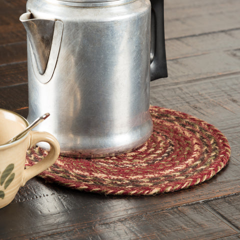 Enhance the look of your dining table with the Cider Mill Jute Trivet. Featuring concentric, mixed braids primitive colors for a classic country look. Visit website for FREE s/h & discount offers. Primitive Country Farmhouse Braided Jute Table Kitchen Decor.