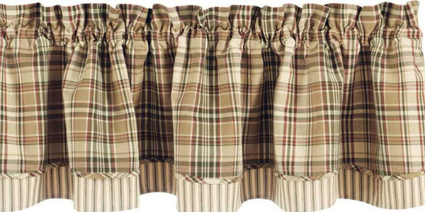 Country living meets style & warmth! This Thyme Layered Valance offers an intriguing design consisting of lovely greens, tans & barn red in two coordinating fabrics! The top layer of plaid is perfectly complemented by the green, red & sand striped pattern that peeks out along the bottom edge! So country charming on its own, or pair with coordinating tiers for a more striking appeal! 