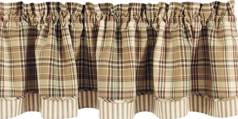 Country living meets style & warmth! This Thyme Layered Valance offers an intriguing design consisting of lovely greens, tans & barn red in two coordinating fabrics! The top layer of plaid is perfectly complemented by the green, red & sand striped pattern that peeks out along the bottom edge! So country charming on its own, or pair with coordinating tiers for a more striking appeal! 
