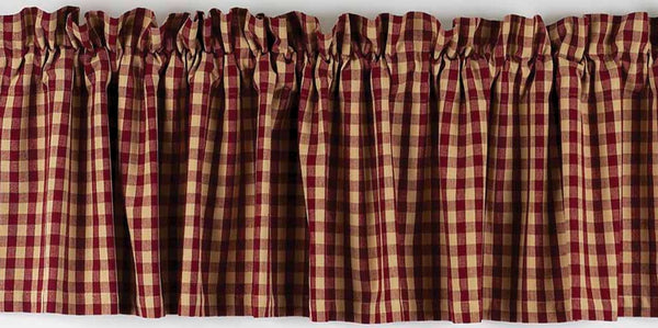 Add primitive country charm with the Heritage House Barn Red Valance. 72"x15.5" cotton with red & tan checks, lined for durability. Perfect farmhouse window décor.