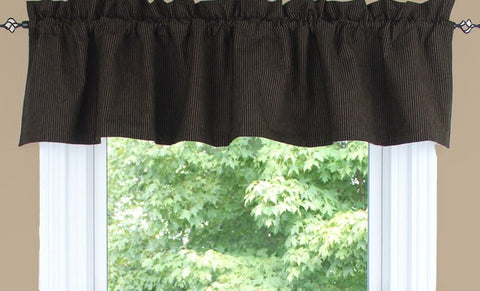 The Primitive Ticking Black Lined Valance is 72" by 15.5" and features a classic black with mustard gold ticking pattern.