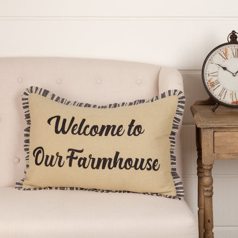 Ashmont Burlap Vintage Welcome to Our Farmhouse Pillow 14x22, features "Welcome to our Farmhouse" across the front on a natural burlap background.  Finished with a ruffled charcoal grey and creme stripe trim for added detail and a vintage flair. Primitive Country Farmhouse Bedding Home Decor.